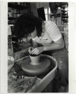 Student working on the pottery wheel in Ceramic Class